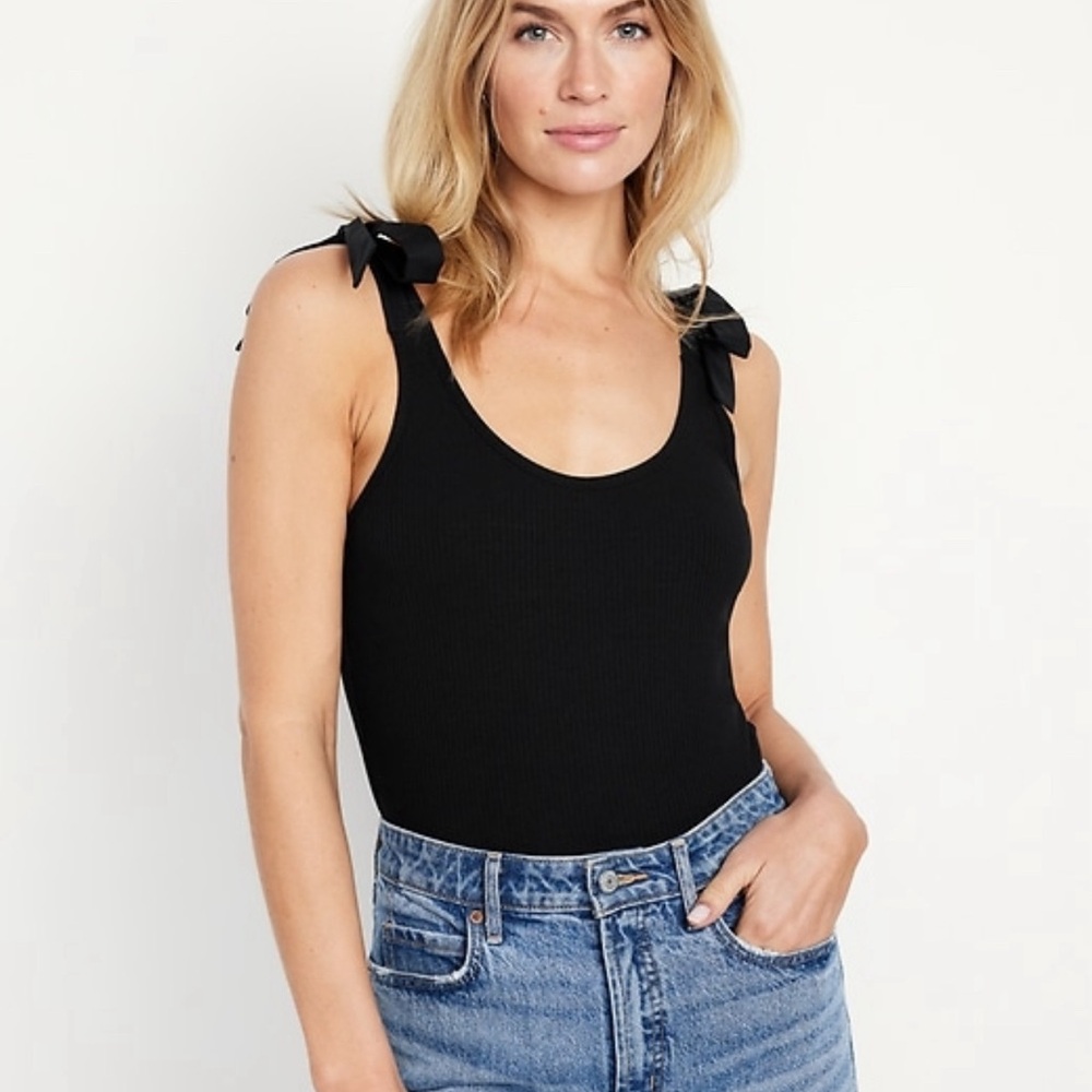 Black body suit that ties at the shoulders with a bow -never worn tags till on